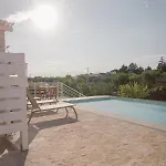 Апартаменты Trulli Harmonia Con Piscina -